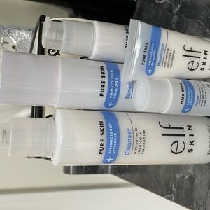 Elf pure skin care, three piece full set and two travel sizes